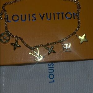 Gold Charm Bracelet with Iconic Symbols